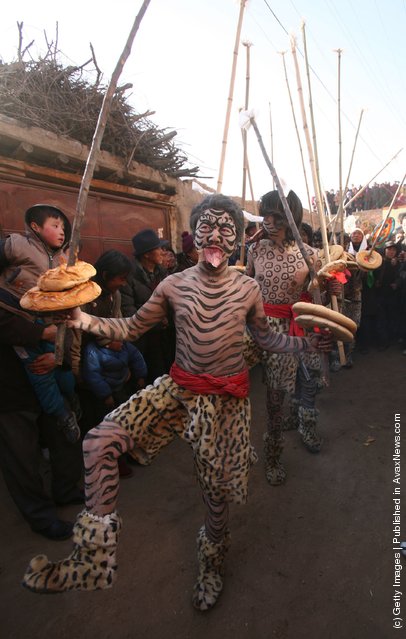 Церемония изгнания злых духов в деревне Няньдуху